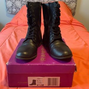 Black combat boots with inside zipper